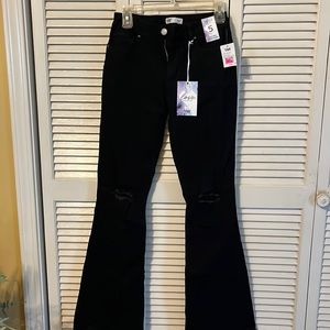 Brand new never worn YMI Black distressed knees super flare high rise jeans